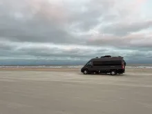 motorhome parked on beach